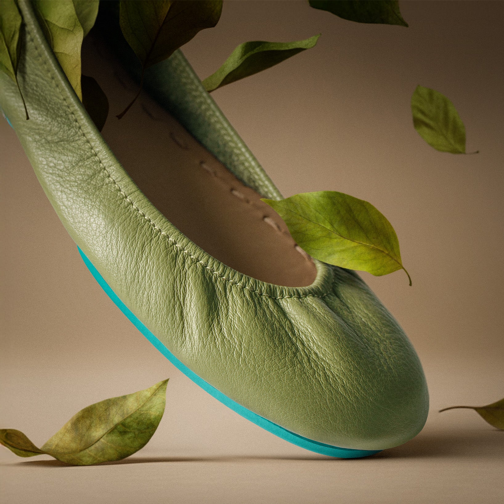 olive tieks ballet flats surrounded by falling leaves