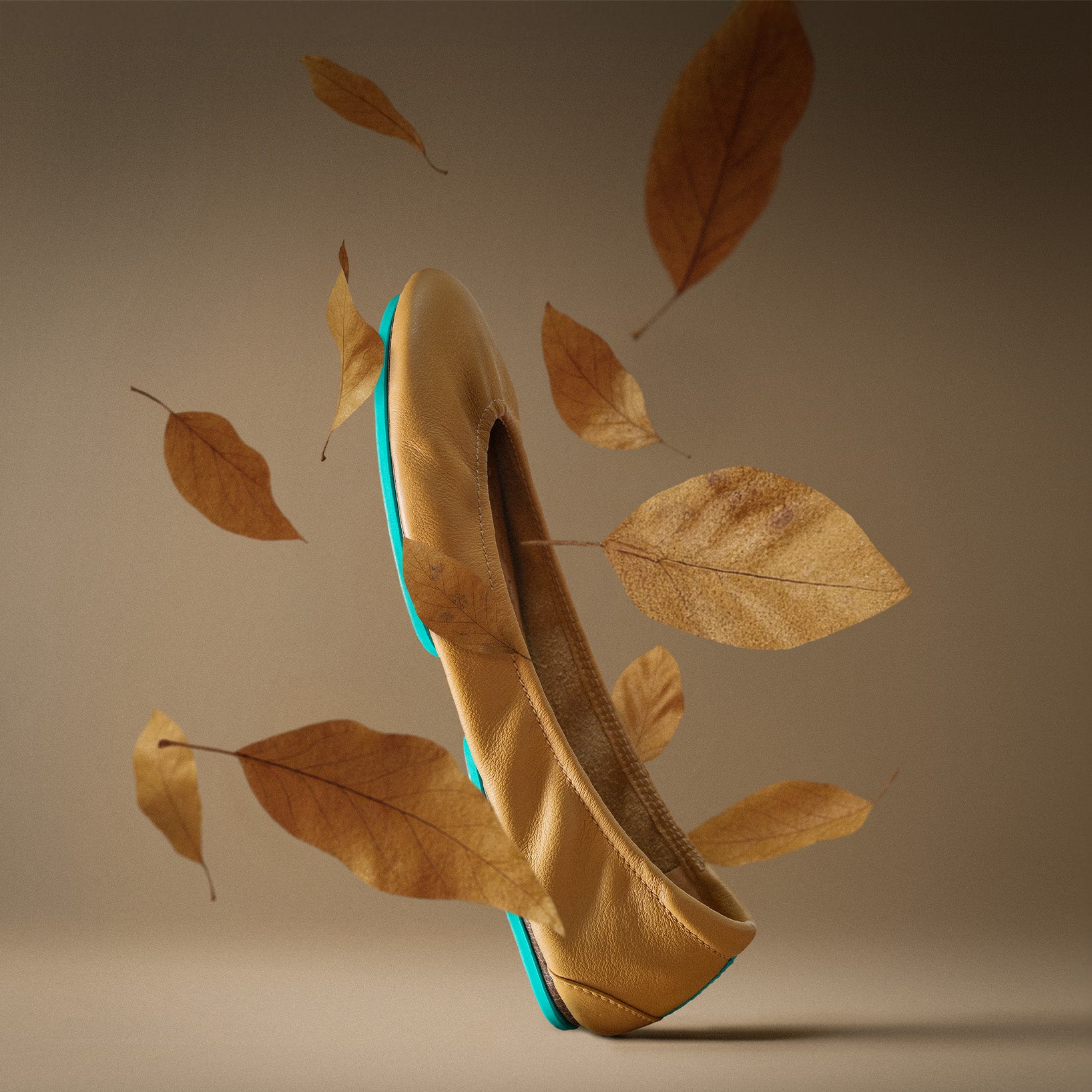 camel tieks ballet flats surrounded by falling leaves