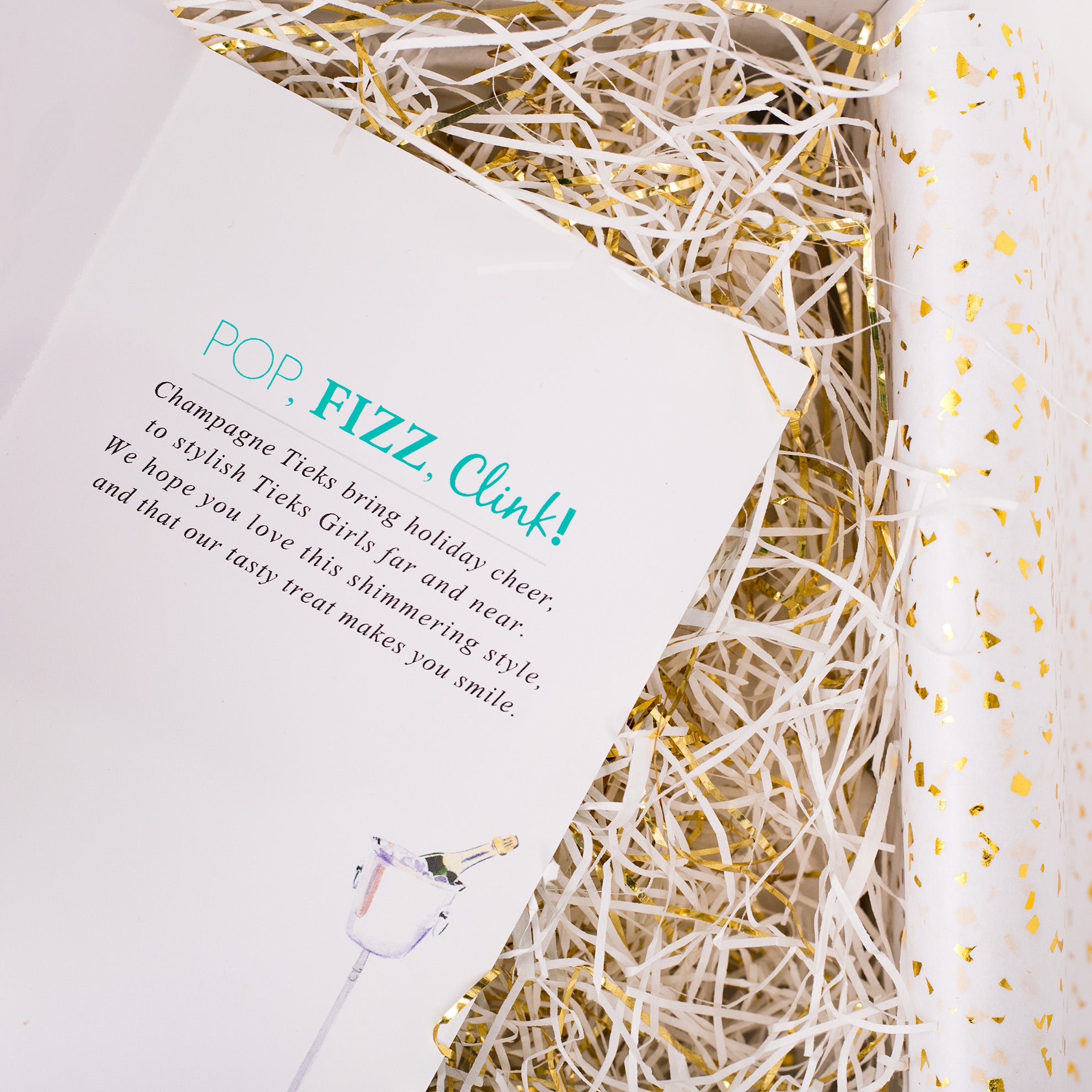 champagne card on top of box