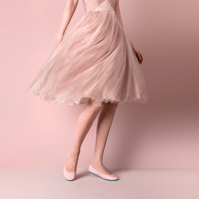 ballerina pink tieks flats styled with a ballerina pink colored dress