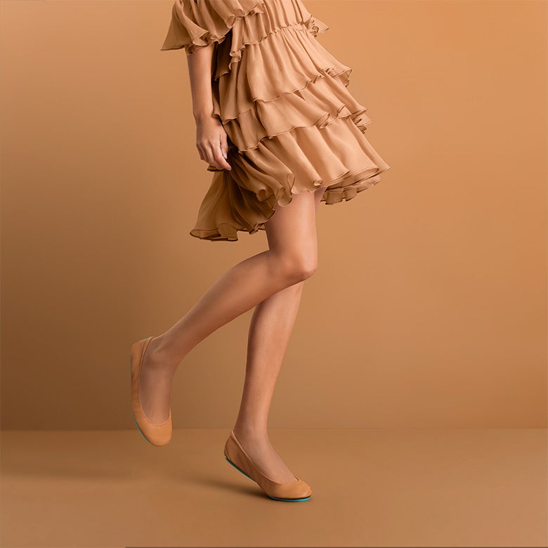 camel tieks flats styled with a camel colored dress