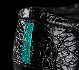 Close up of Tieks ballet flat cushioned heel and signature Tiek Blue stripe.