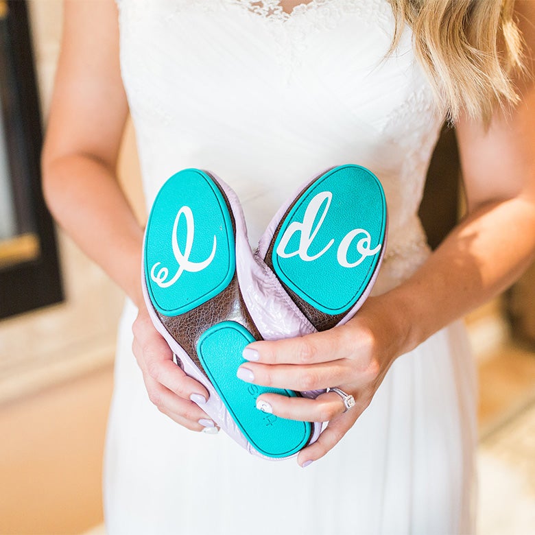 tieks flats with "I do" written on soles