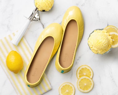 lemon tieks flats on a counter with lemons and ice cream