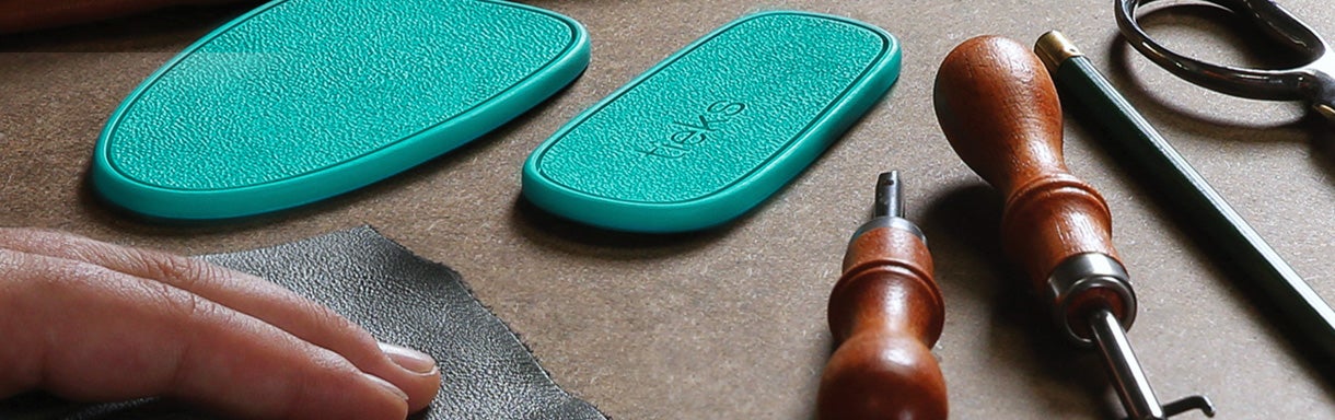 the components and tools to make a pair of tieks flats